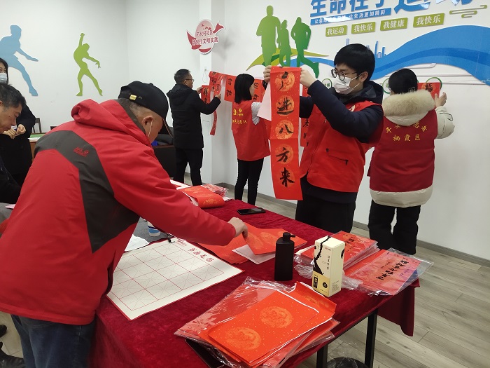 1.24石化村社区红会开展“虎年迎新春 送福进万家”惠民义写春联活动-1.jpg